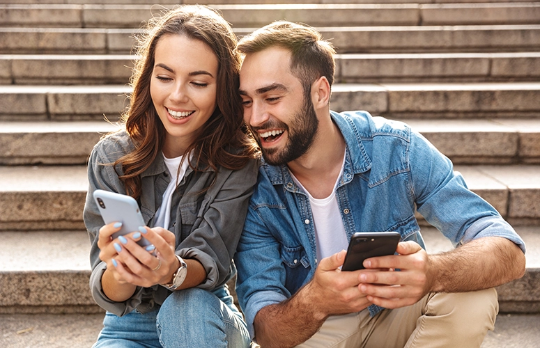couple looking at phones