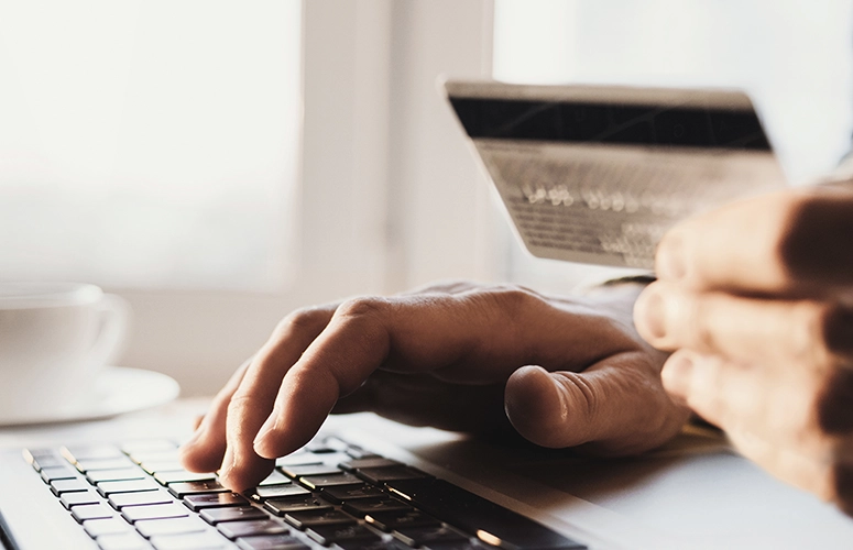 hand holding debit card